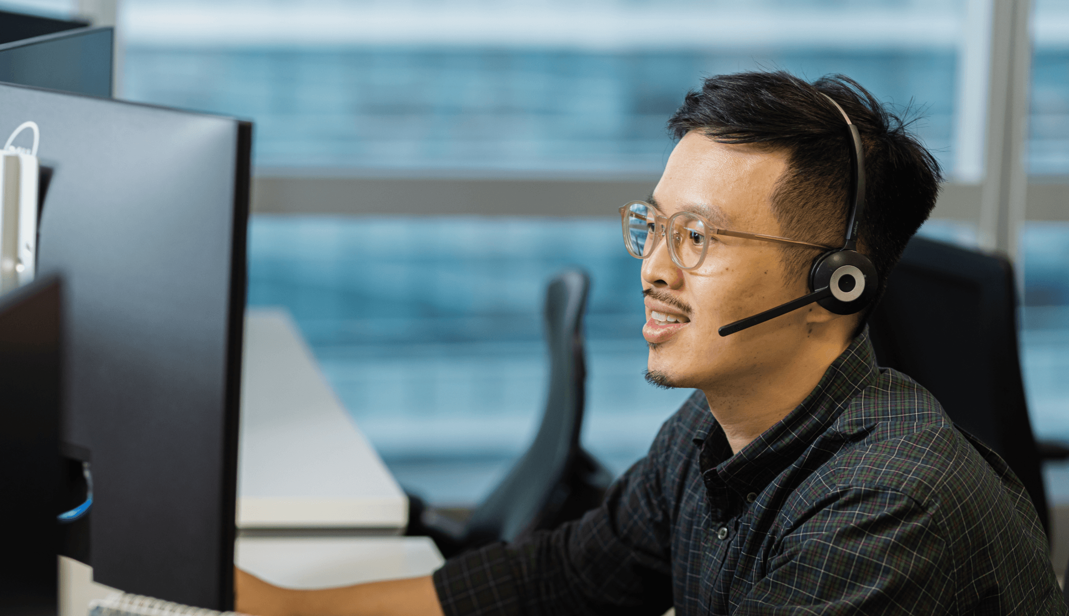 Customer service employee speaking with a customer